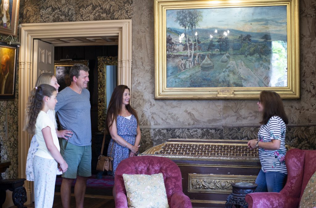 Tour the Castle's Historic Interior - a family enjoys a house tour